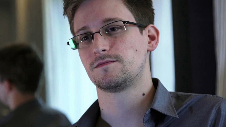 Snowden says 'Not all spying is bad,' out-dated laws keep him in exile