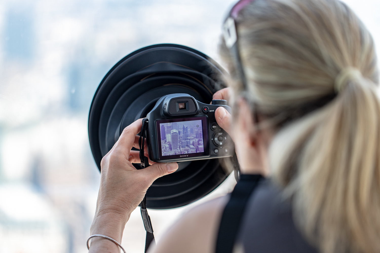 Clever accessory helps photographers shoot through glass without the glare