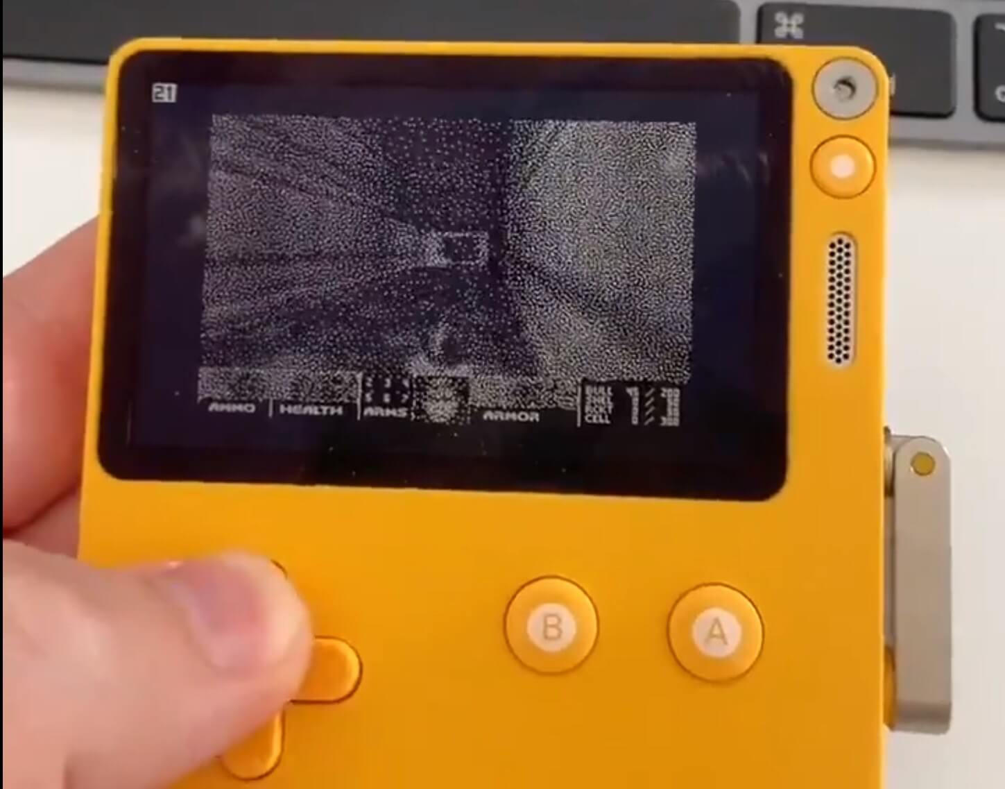 Watch Doom running on the Playdate, a handheld with a crank controller