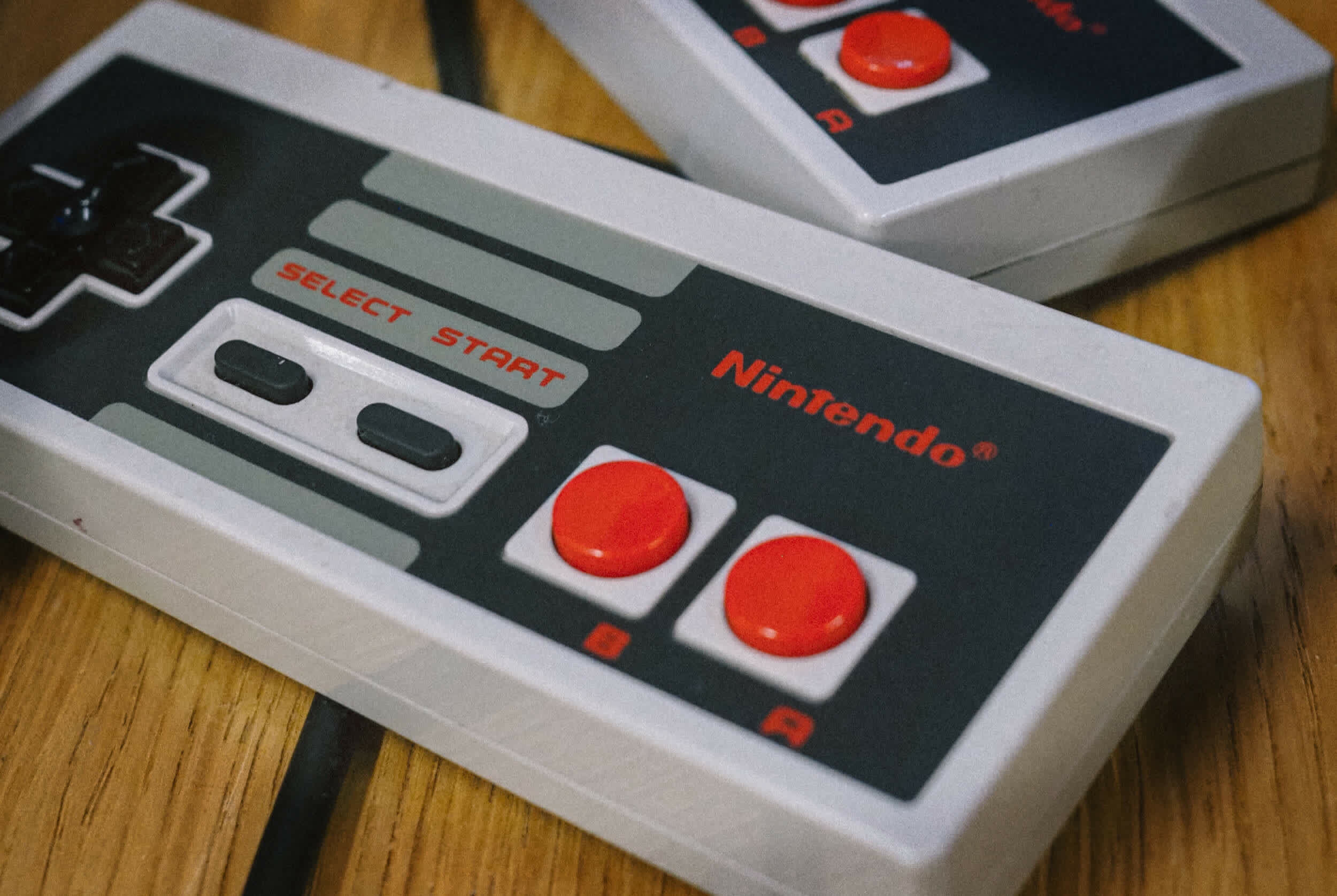 Palm-sized NES clone plays classic cartridges using the same chips that powered the original Nintendo