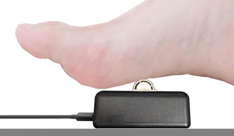 Take a look at this tiny mouse wheel you can operate with your foot