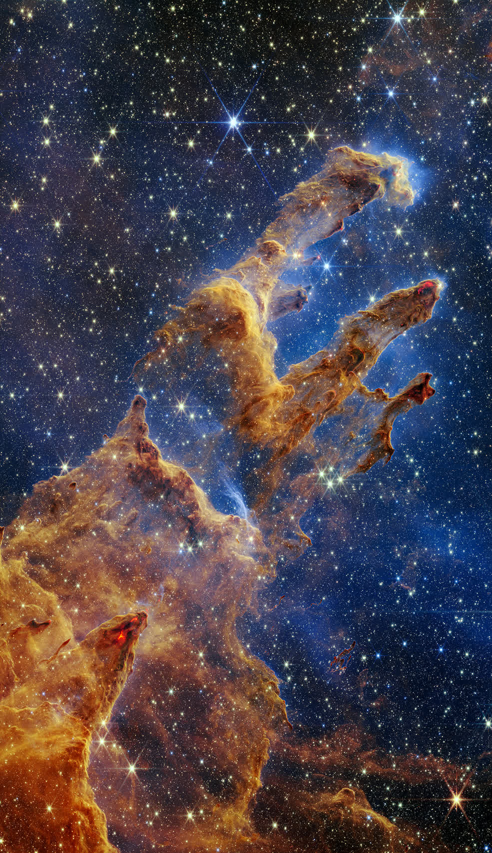 Webb's portrait of the Pillars of Creation is a star-filled delight