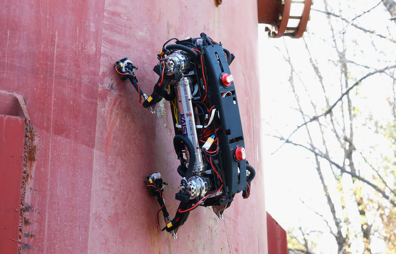 Quadruped robot with magnetic feet can climb walls and traverse ceilings